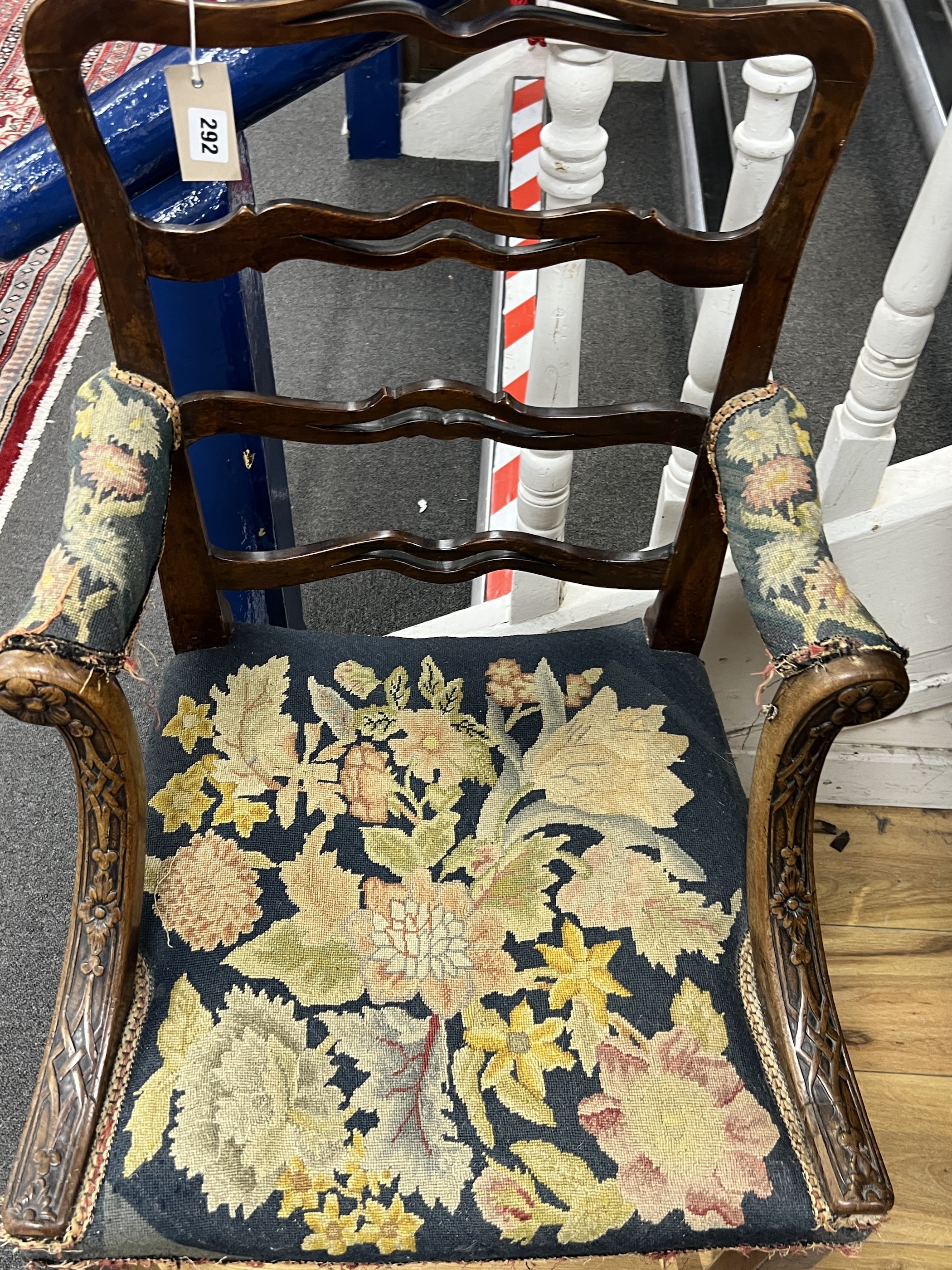 A George III mahogany ladder back elbow chair, width 54cm, depth 47cm, height 94cm